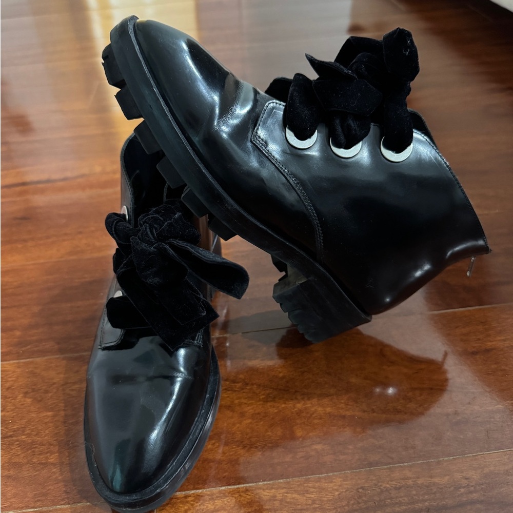 Sandro patent leather ankle boot with thick velvet laces and chunky rubber sole